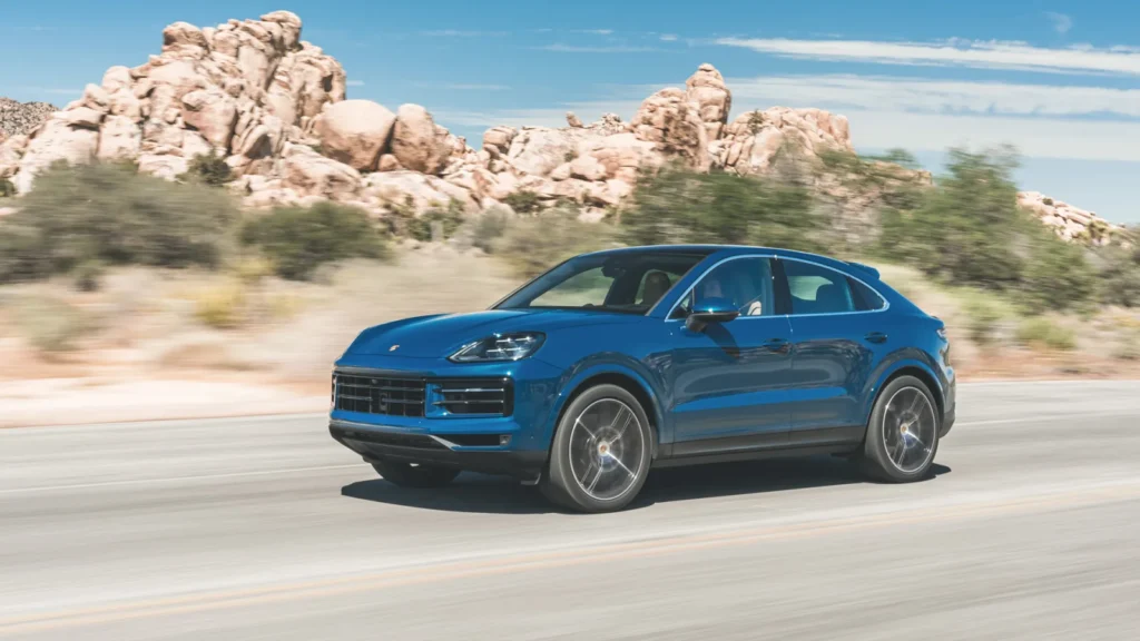 2024 Porsche Cayenne S Coupe action front three quarter 1 Top Cars With Full Width Tail Lights 2024